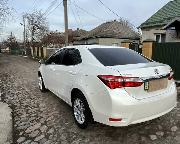 Белый Тойота Королла, объемом двигателя 1.6 л и пробегом 142 тыс. км за 12000 $, фото 4 на Automoto.ua