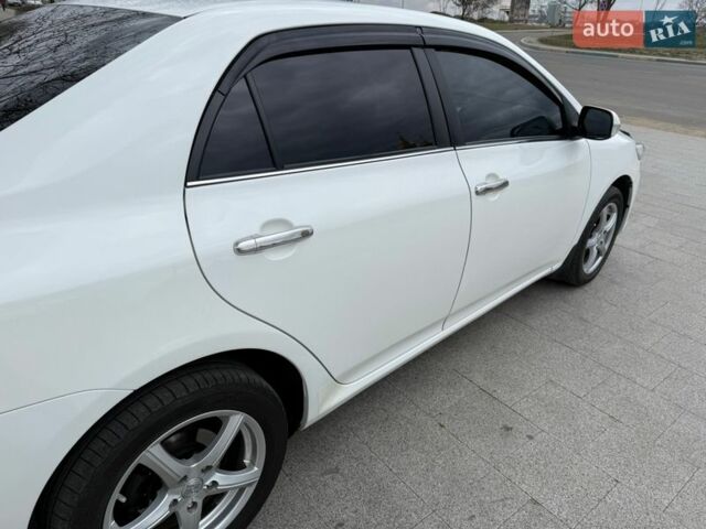 Белый Тойота Королла, объемом двигателя 1.6 л и пробегом 106 тыс. км за 11200 $, фото 5 на Automoto.ua