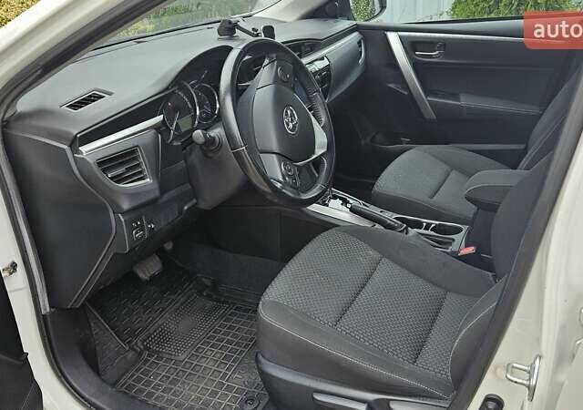 Білий Тойота Королла, об'ємом двигуна 1.6 л та пробігом 196 тис. км за 12900 $, фото 4 на Automoto.ua