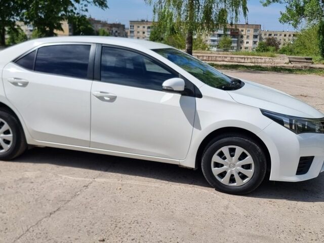Білий Тойота Королла, об'ємом двигуна 1.3 л та пробігом 98 тис. км за 8200 $, фото 1 на Automoto.ua