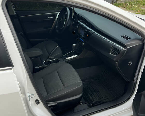 Белый Тойота Королла, объемом двигателя 1.6 л и пробегом 142 тыс. км за 12000 $, фото 22 на Automoto.ua