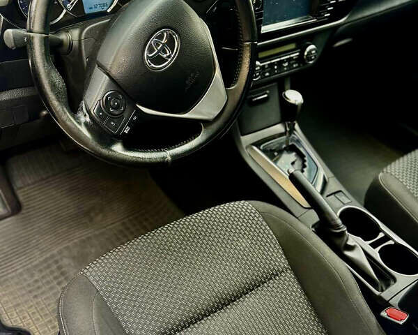 Білий Тойота Королла, об'ємом двигуна 1.6 л та пробігом 120 тис. км за 12500 $, фото 10 на Automoto.ua