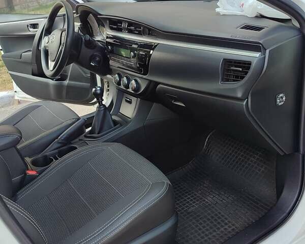 Белый Тойота Королла, объемом двигателя 1.3 л и пробегом 77 тыс. км за 10999 $, фото 6 на Automoto.ua