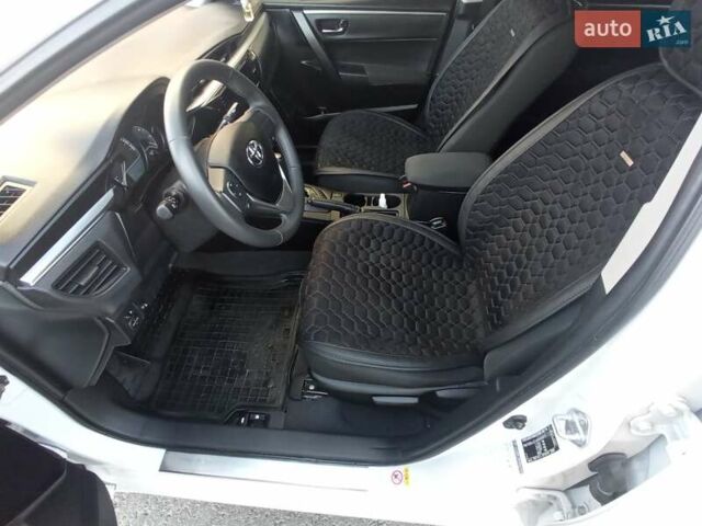 Білий Тойота Королла, об'ємом двигуна 1.6 л та пробігом 152 тис. км за 13300 $, фото 12 на Automoto.ua