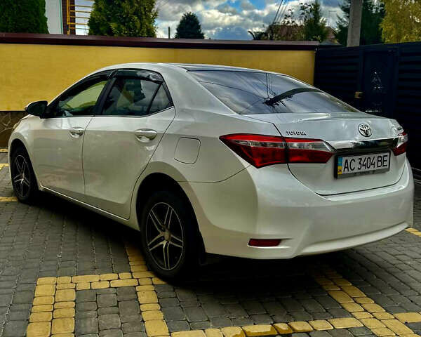 Білий Тойота Королла, об'ємом двигуна 1.6 л та пробігом 120 тис. км за 12500 $, фото 6 на Automoto.ua