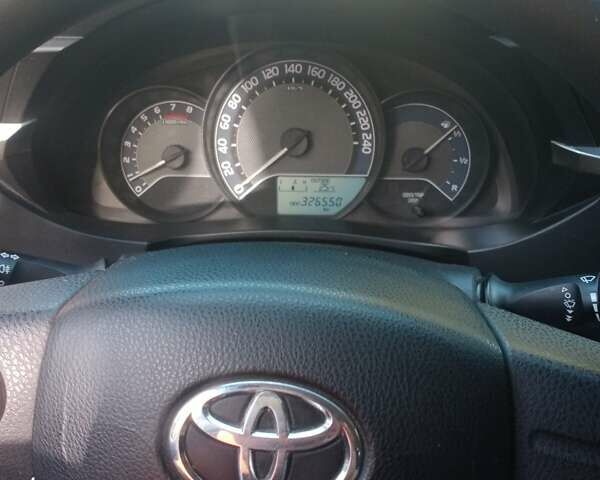 Белый Тойота Королла, объемом двигателя 1.33 л и пробегом 320 тыс. км за 7000 $, фото 5 на Automoto.ua