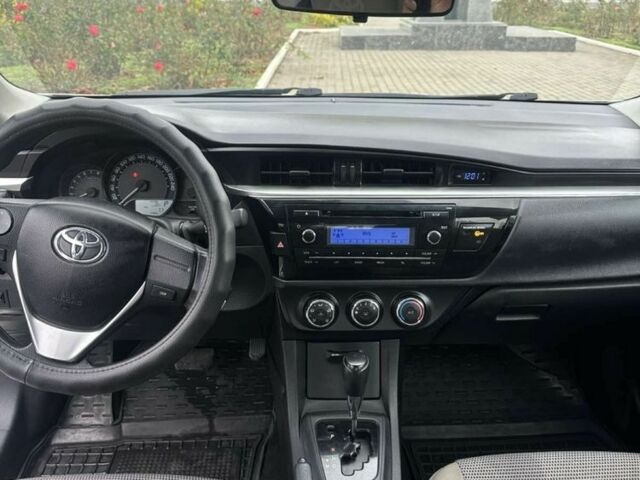 Белый Тойота Королла, объемом двигателя 1.6 л и пробегом 145 тыс. км за 12500 $, фото 6 на Automoto.ua