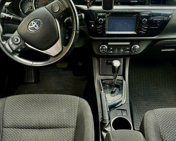 Білий Тойота Королла, об'ємом двигуна 1.6 л та пробігом 120 тис. км за 12500 $, фото 11 на Automoto.ua