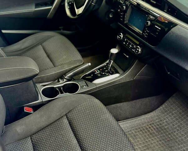 Білий Тойота Королла, об'ємом двигуна 1.6 л та пробігом 120 тис. км за 12500 $, фото 12 на Automoto.ua