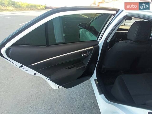 Білий Тойота Королла, об'ємом двигуна 1.6 л та пробігом 152 тис. км за 13300 $, фото 17 на Automoto.ua