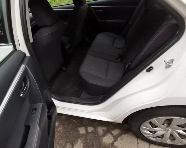Білий Тойота Королла, об'ємом двигуна 1.6 л та пробігом 227 тис. км за 8900 $, фото 7 на Automoto.ua
