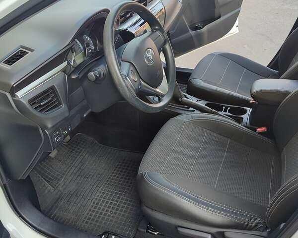 Белый Тойота Королла, объемом двигателя 1.3 л и пробегом 77 тыс. км за 10999 $, фото 7 на Automoto.ua