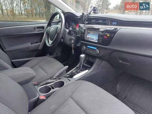 Білий Тойота Королла, об'ємом двигуна 1.6 л та пробігом 134 тис. км за 12500 $, фото 9 на Automoto.ua