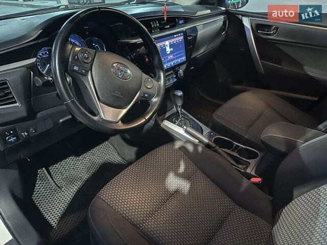 Білий Тойота Королла, об'ємом двигуна 1.6 л та пробігом 190 тис. км за 13200 $, фото 8 на Automoto.ua