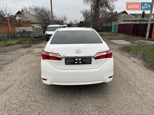Белый Тойота Королла, объемом двигателя 1.6 л и пробегом 136 тыс. км за 13500 $, фото 4 на Automoto.ua