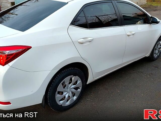 Белый Тойота Королла, объемом двигателя 1.6 л и пробегом 132 тыс. км за 13800 $, фото 5 на Automoto.ua