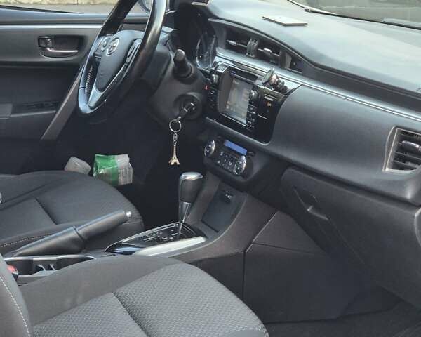 Білий Тойота Королла, об'ємом двигуна 1.6 л та пробігом 122 тис. км за 12000 $, фото 9 на Automoto.ua