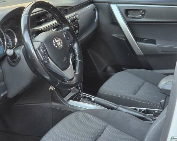 Білий Тойота Королла, об'ємом двигуна 1.6 л та пробігом 122 тис. км за 12000 $, фото 14 на Automoto.ua