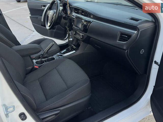 Белый Тойота Королла, объемом двигателя 1.6 л и пробегом 94 тыс. км за 14500 $, фото 46 на Automoto.ua