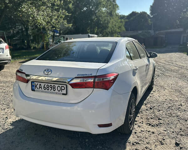 Белый Тойота Королла, объемом двигателя 1.6 л и пробегом 248 тыс. км за 11000 $, фото 3 на Automoto.ua