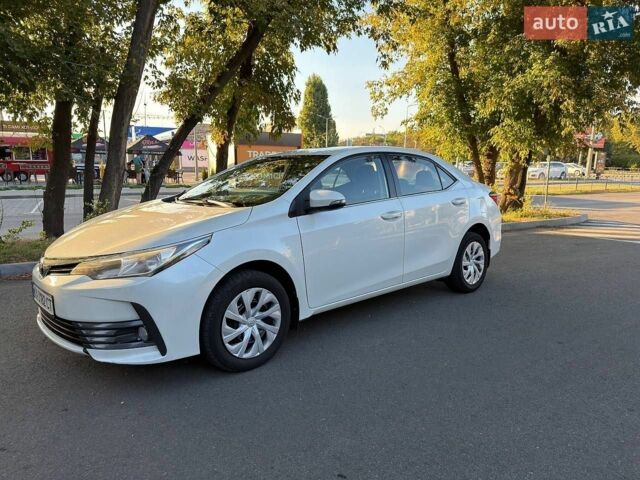 Белый Тойота Королла, объемом двигателя 1.6 л и пробегом 160 тыс. км за 12500 $, фото 5 на Automoto.ua