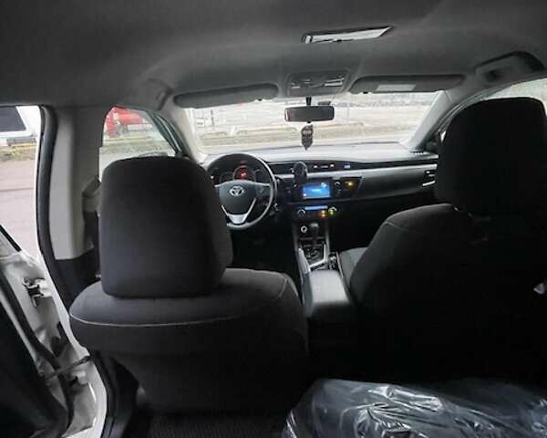 Белый Тойота Королла, объемом двигателя 1.6 л и пробегом 120 тыс. км за 14500 $, фото 5 на Automoto.ua
