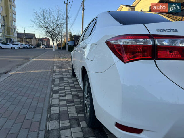 Белый Тойота Королла, объемом двигателя 1.6 л и пробегом 125 тыс. км за 12600 $, фото 6 на Automoto.ua