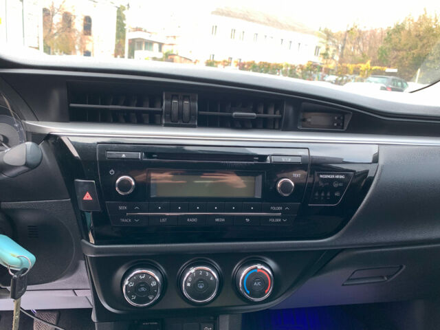 Белый Тойота Королла, объемом двигателя 1.3 л и пробегом 150 тыс. км за 12390 $, фото 19 на Automoto.ua