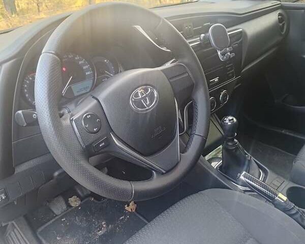 Білий Тойота Королла, об'ємом двигуна 1.6 л та пробігом 203 тис. км за 10000 $, фото 4 на Automoto.ua