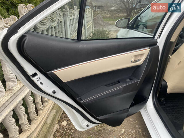 Белый Тойота Королла, объемом двигателя 1.8 л и пробегом 47 тыс. км за 10999 $, фото 36 на Automoto.ua