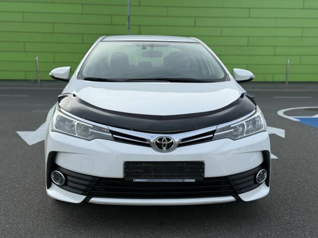 Белый Тойота Королла, объемом двигателя 1.6 л и пробегом 169 тыс. км за 9900 $, фото 1 на Automoto.ua