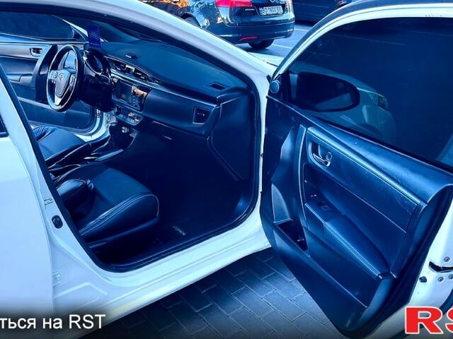 Белый Тойота Королла, объемом двигателя 1.8 л и пробегом 200 тыс. км за 11750 $, фото 7 на Automoto.ua