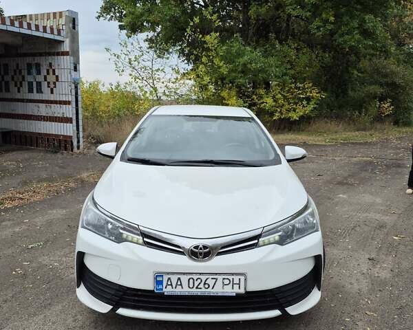 Белый Тойота Королла, объемом двигателя 1.33 л и пробегом 222 тыс. км за 9600 $, фото 6 на Automoto.ua