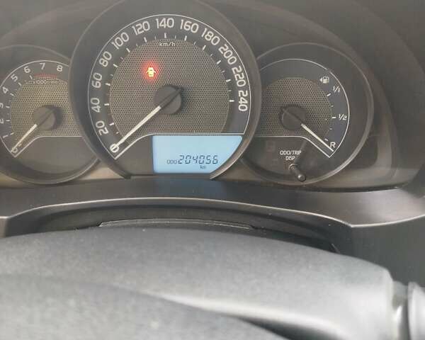 Белый Тойота Королла, объемом двигателя 1.33 л и пробегом 204 тыс. км за 8700 $, фото 6 на Automoto.ua