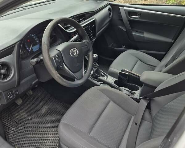 Белый Тойота Королла, объемом двигателя 1.33 л и пробегом 222 тыс. км за 9600 $, фото 4 на Automoto.ua