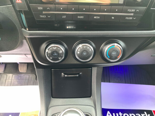 Белый Тойота Королла, объемом двигателя 1.3 л и пробегом 150 тыс. км за 12390 $, фото 20 на Automoto.ua