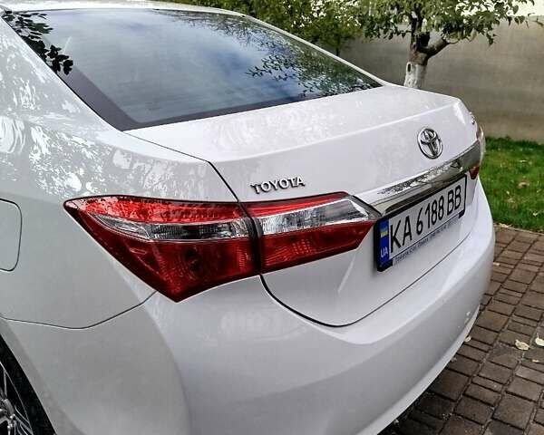 Белый Тойота Королла, объемом двигателя 1.33 л и пробегом 204 тыс. км за 8700 $, фото 3 на Automoto.ua