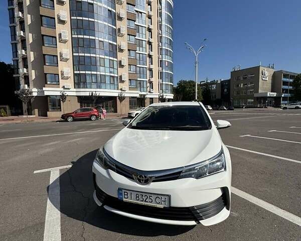 Белый Тойота Королла, объемом двигателя 1.3 л и пробегом 67 тыс. км за 14000 $, фото 1 на Automoto.ua