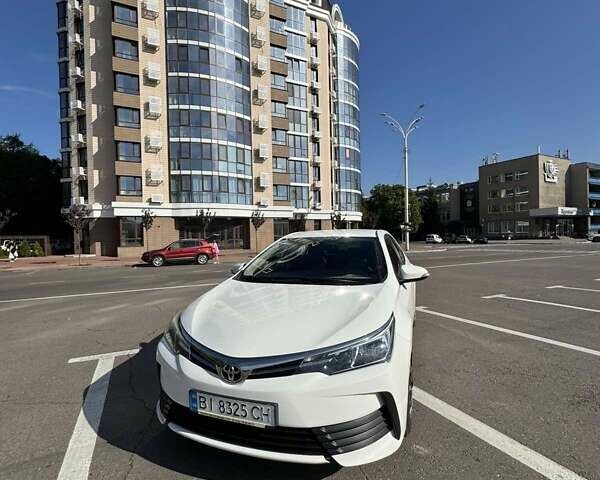 Белый Тойота Королла, объемом двигателя 1.3 л и пробегом 67 тыс. км за 14000 $, фото 7 на Automoto.ua