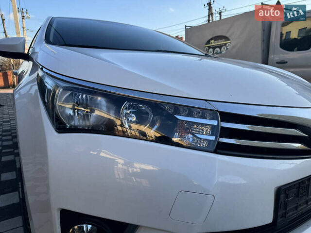 Белый Тойота Королла, объемом двигателя 1.6 л и пробегом 125 тыс. км за 12600 $, фото 12 на Automoto.ua