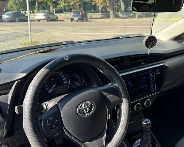 Белый Тойота Королла, объемом двигателя 1.3 л и пробегом 67 тыс. км за 14000 $, фото 4 на Automoto.ua