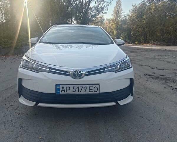 Білий Тойота Королла, об'ємом двигуна 1.6 л та пробігом 203 тис. км за 10000 $, фото 14 на Automoto.ua