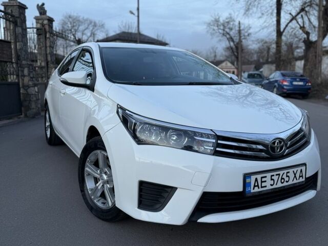 Білий Тойота Королла, об'ємом двигуна 1.6 л та пробігом 180 тис. км за 12599 $, фото 1 на Automoto.ua