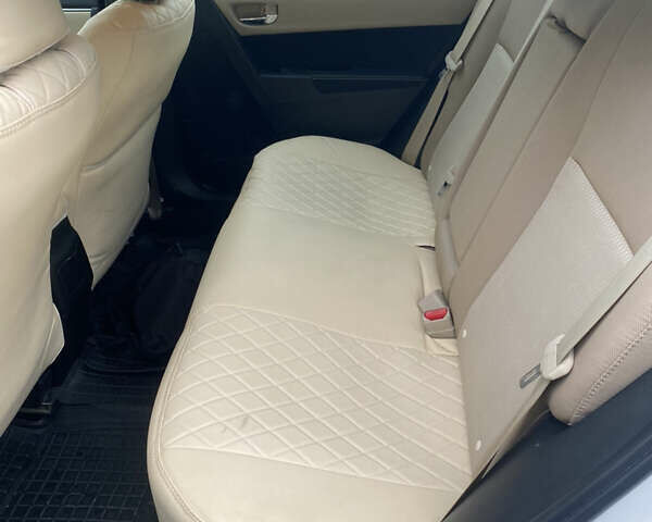 Белый Тойота Королла, объемом двигателя 1.8 л и пробегом 47 тыс. км за 10999 $, фото 34 на Automoto.ua