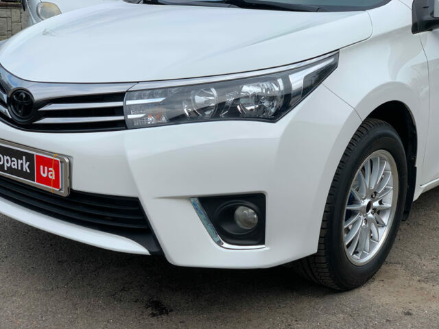Белый Тойота Королла, объемом двигателя 1.3 л и пробегом 150 тыс. км за 12390 $, фото 4 на Automoto.ua