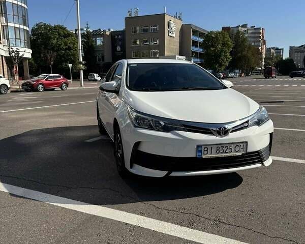 Белый Тойота Королла, объемом двигателя 1.3 л и пробегом 67 тыс. км за 14000 $, фото 2 на Automoto.ua