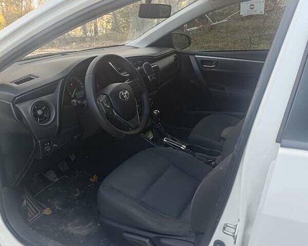Білий Тойота Королла, об'ємом двигуна 1.6 л та пробігом 203 тис. км за 10000 $, фото 9 на Automoto.ua