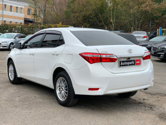 Белый Тойота Королла, объемом двигателя 1.3 л и пробегом 150 тыс. км за 12390 $, фото 24 на Automoto.ua