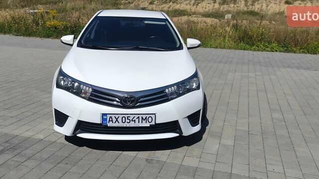 Белый Тойота Королла, объемом двигателя 1.33 л и пробегом 118 тыс. км за 10500 $, фото 2 на Automoto.ua