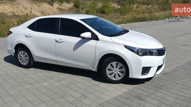 Белый Тойота Королла, объемом двигателя 1.33 л и пробегом 118 тыс. км за 10500 $, фото 10 на Automoto.ua